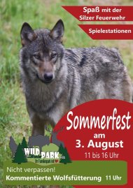 Ein Plakat preist das Sommerfest im Wild- und Wanderpark Südliche Weinstraße in Silz am 3. August 2025 an. Groß angepriesen wird vor allem die kommentierte Wolfsfütterung um 11 Uhr. Das Bild eines Wolfes prägt das Plakat.